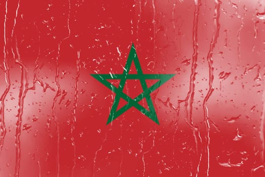 3D Flag of Morocco on a glass with water drop background.