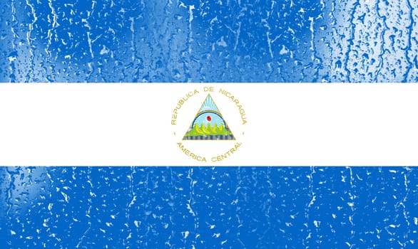 3D Flag of Nicaragua on a glass with water drop background.
