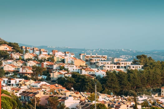 Kusadasi, Turkey. Beautiful Cityscape Of Turkish Town. White Residential Houses On Hillside. Real Estate Suburb In Summer Evening.