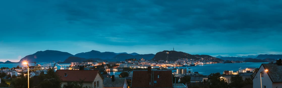 Alesund, Norway. Night Alesund Skyline Cityscape. Historical Center In Summer Evening. Famous Norwegian Landmark And Popular Destination. Alesund, Kiven viewpoint, Mt. Panorama Panoramic View