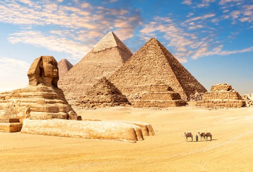 The Great Sphinx next to the Pyramids of Egypt in the desert of Giza.
