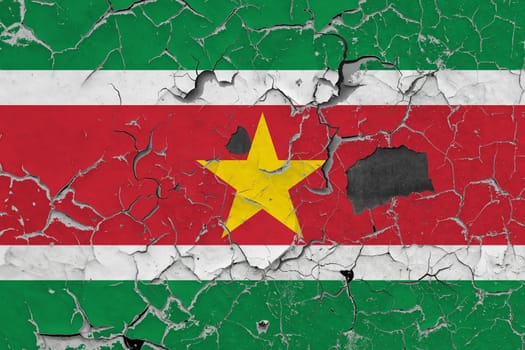 3D Flag of Suriname on an old stone wall background.