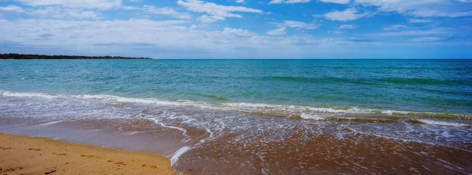 Panoramic view of the blue green waters of Hervey Bay at Pialba beach Queensland. Hervey Bay is a very popular tourist destination.