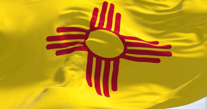 Flag of New Mexico state waving in the wind on a clear day. New Mexico is a federated state in the southwestern United States. Us state flag. 3D render