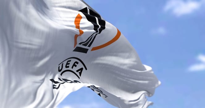 Budapest HUN, July 2022: Rear view of the UEFA Europa League flag waving in the wind. Europa League is an annual football club competition for european clubs