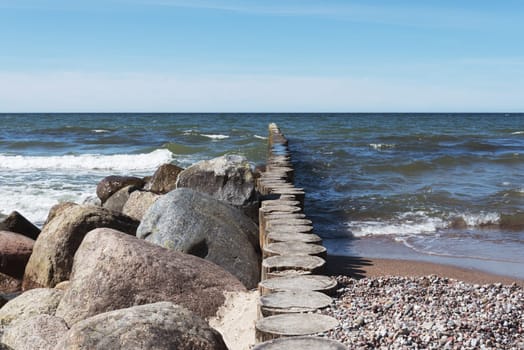 Sea coast, beautiful sky, waves on the sea.