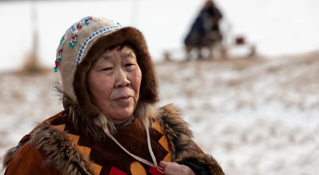 Kamchatka, Russia: 25 December, 2021: The woman in traditional Koryak dress on holiday Northern aboriginal Koryak was Hololo.