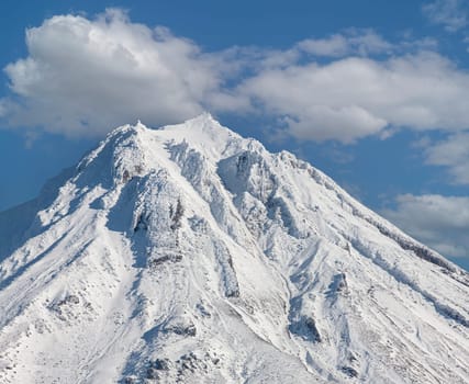 The snowy peak of the Vilyuchinsky volcano on the Kamchatka Peninsula
