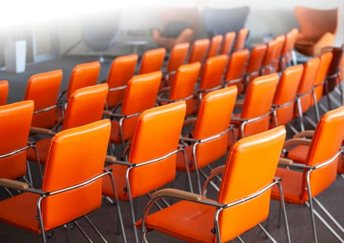 The red chairs in ordinary empty waiting room. Selective focus