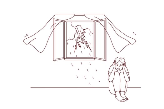 Scared girl sitting on floor afraid of storm outdoors. Terrified young woman feel stressed and frightened of lightning and thunderstorm. Vector illustration.