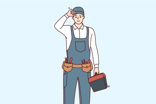 Smiling young maintenance worker in uniform with tools in hands. Happy male repairman or mechanic with box of instruments and equipment. Vector illustration.