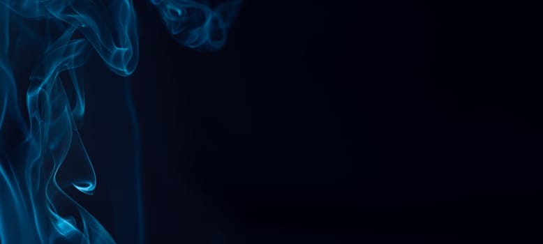 Creative background partially blurred image, horizontal dark blue banner with puffs of neon blue white smoke. Copy space. Place for text