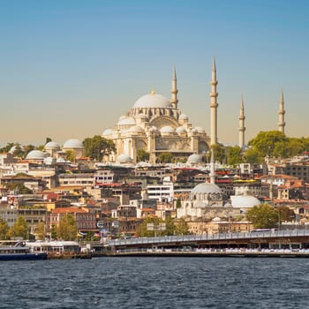 Istanbul, Turkey - August 29, 2022: Istanbul city view from Karakoy overlooking Golden Horn with Galata Bridge, and Suleymaniye Mosque, in a summer day