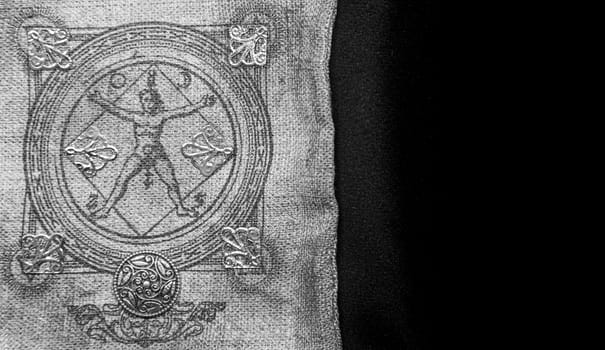 Ancient esoteric witchcraft background. Occultims and paganism old symbol, with mysterious runes and alphabet.