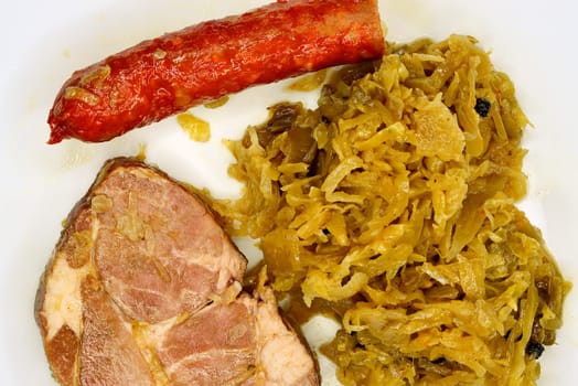 German deli Sauerkraut with sausage and pork meat