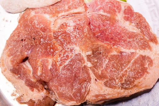 Raw pork on plate, Korean traditional style fresh pork beef belly BBQ, Japanese meat hot pot or Shabu in the restaurant, barbecue food
