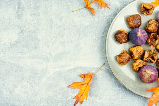Fig tree fruits, dried figs. Dried fruit, autumn sweet. Flat lay with copy space