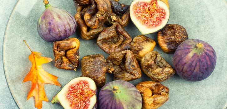 Fig tree fruits, dried figs. Dried fruit, autumn sweet. Flat lay with copy space