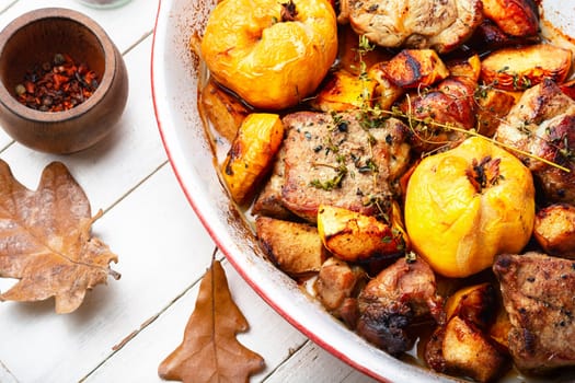 Appetizing pork stew with quince. Autumn recipe