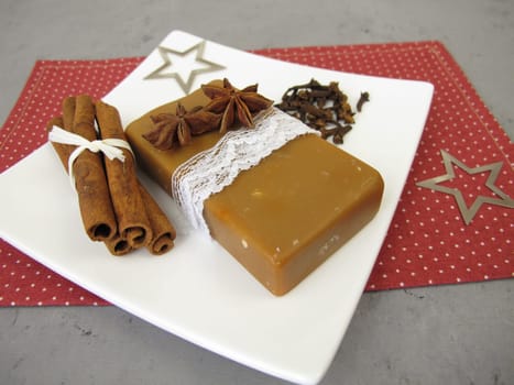 Handmade natural soap bar with Christmas scent of cinnamon, star anise and clove