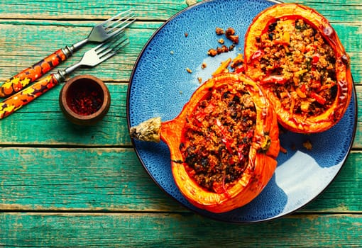 Baked pumpkin stuffed with vegetables, a popular autumn food.