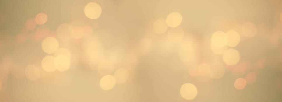 Bokeh background for christmas, defocused round lights in golden color, flare overlay