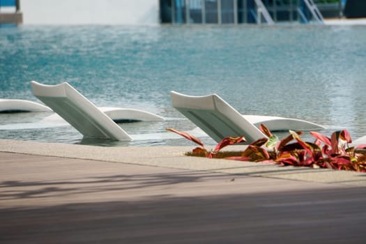 Select focus white chair in swimming pool
