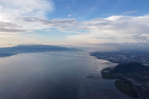 Aerial view Penang Bridge connect mainland and island in blue cloud day