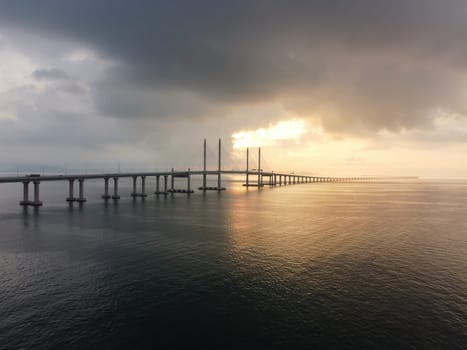 Aerial view sunrise hour over morning low cloud at Penang Second Bridge