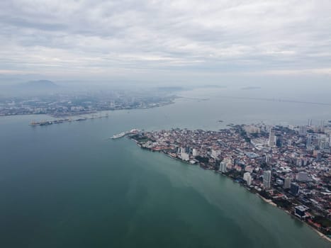 Drone shot of Penang Island and mainland in overcast day