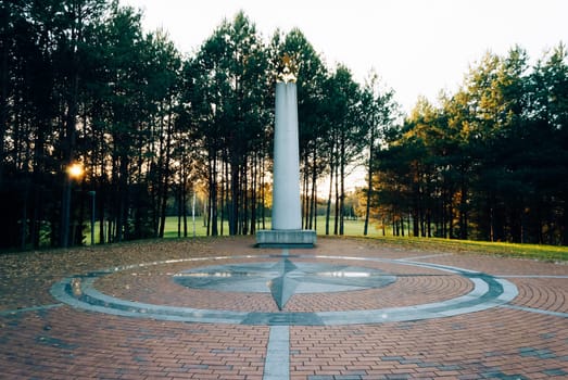 Purnushkes, Lithuania - 2021.10.09: monument to the sculptor Gediminas Jokubonis in the geographical center of Europe.