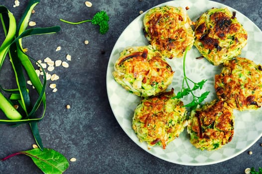 Vegan rissole from zucchini, oatmeal and greens. Healthy food