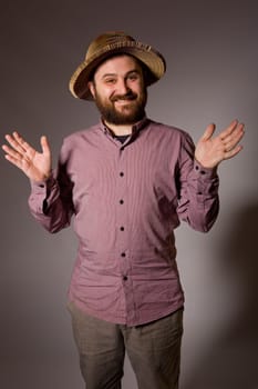 young casual man portrait in a dark background