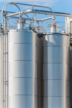 Detail of chemical plant, silos and pipes