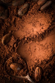 Aromatic Cocoa powder and cocoa beans in brown