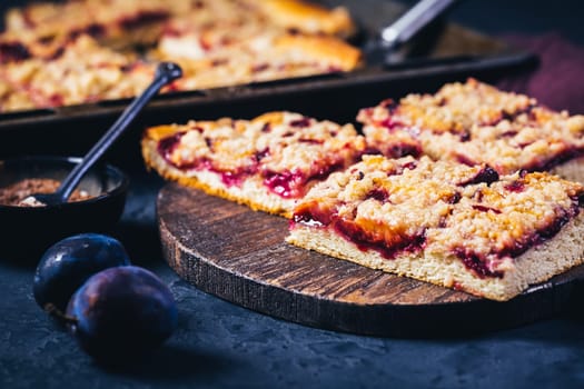 German plum cake (Zwetschgenkuchen) with yeast dough and crumbles