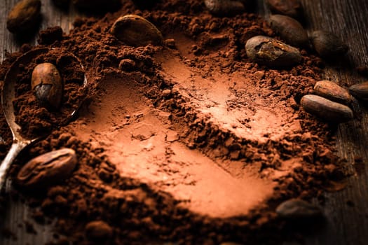 Aromatic Cocoa powder and cocoa beans in brown