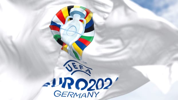Berlin, Ger, October 2022: The flag of UEFA Euro 2024 flying in the wind. The 17th edition will take place from 14 June to 14 July 2024 in Germany. Selective focus. International sport event