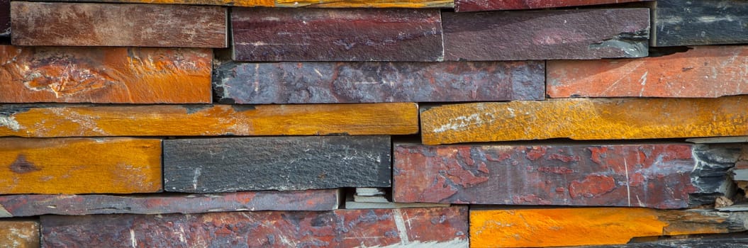 Natural colorful rust slate wall. Long format