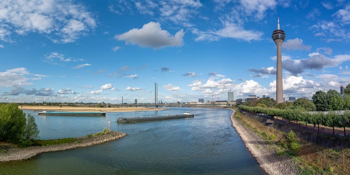 DUSSELDORF, GERMANY - SEPTEMBER 8, 2022: Panoramic image of Rhine river close to Dusseldorf on September 8, 2022 in Germany, Europe