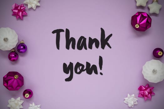 Christmas Card With English Text Thank You. Purple Christmas Background With Romantic And Brilliant Decoration Like Balls.