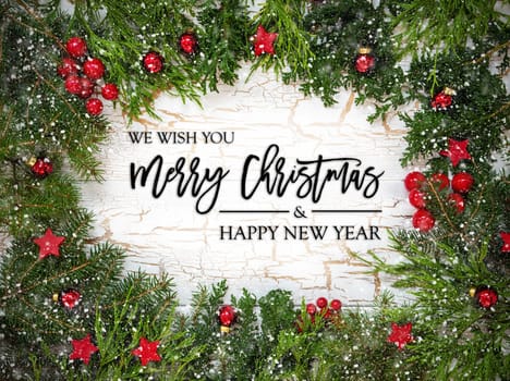 Christmas Card With Fir Branches And English Text Merry Christmas And A Happy New Year. White Wooden Background With Vintage Design, Christmas Decoration Like Red Ornament Balls And Snowflakes.