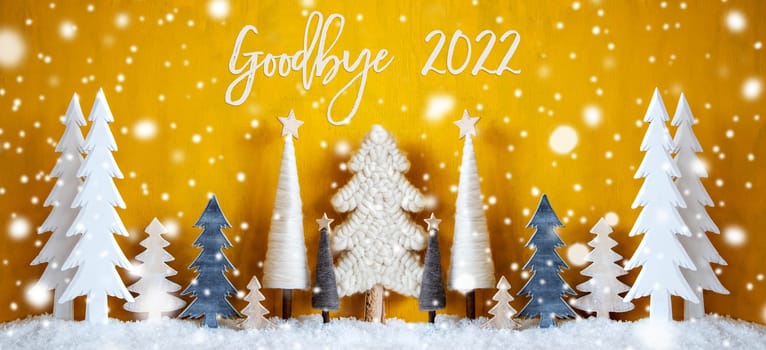 Banner Of Christmas Trees With English Calligraphy Goodbye 2022. Yellow Wooden Rustic Background With Snow And Snowflakes. Christmas Decoration With Stars.