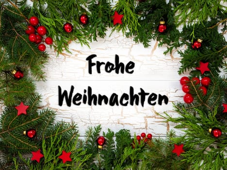 Christmas Card With Fir Branches And German Text Frohe Weihnachten Means Merry Christmas. White Wooden Background With Vintage Design And Christmas Decoration Like Red Ornament Balls.