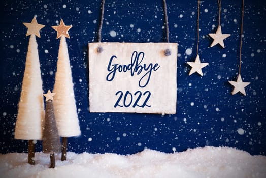 Christmas Decoration Like White Tree With Star On Blue Background. White Snow On Ground With Snowflakes. Sign With English Calligraphy Goodbye 2022