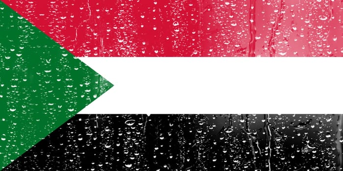 3D Flag of Sudan on a glass with water drop background.