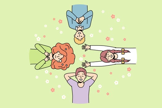Guys, girls lie on grass among flowers in different directions, look at sky, laugh. Friends spend time at lawn. Top view. Hello spring, summer concept. Vector colorful outline illustration.
