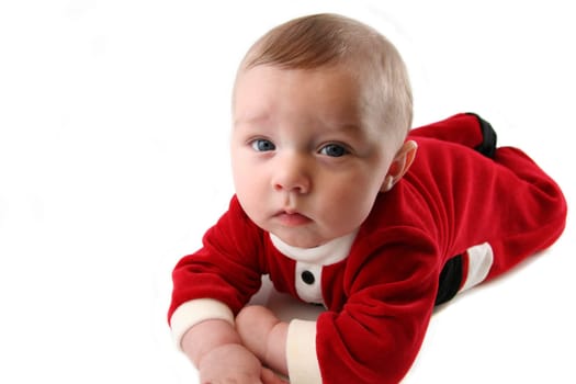 Baby Boy Laying Down in Santa Claus Outfit