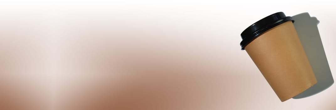 Cardboard coffee cup with a plastic lid on a white-beige background. Banner with copy space. The concept of ecology, recycling, environmental protection.
