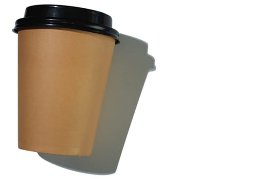 Cardboard coffee cup with plastic lid with hard shadow on white background. isolated object. Template with copy space. The concept of ecology, recycling, environmental protection.